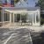 Backyard Patio Garden with Sun Protection and Ventilation Feature Ideal Relaxing Entertaining Lounging Retractable Pergola